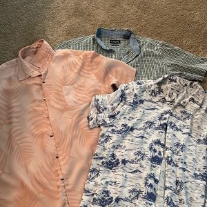 Three short sleeve button up shirts
